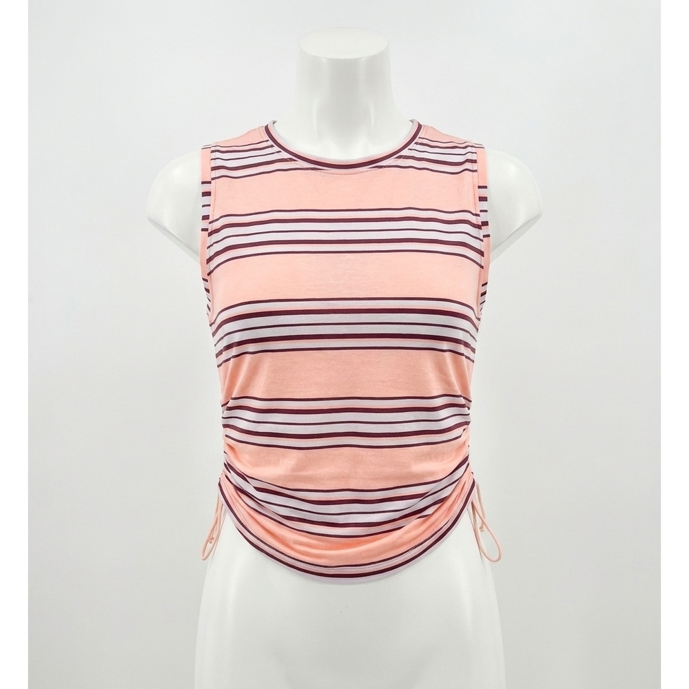 NEW FREE PEOPLE movement sport mode muscle tee in pastel peach combo